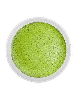 Whisked bowl of Japanese Matcha with smooth frothy layer, ceremonial style.