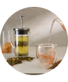 Loose leaf cold brew tea steeping in a glass jug