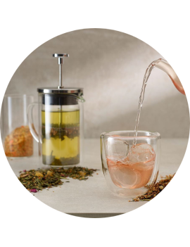 Loose leaf cold brew tea steeping in a glass jug