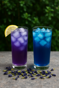 iced blue butterfly pea tea Two glasses of iced Blue Butterfly Pea Tea—one still blue and icy, the other turned purple after adding lemon.